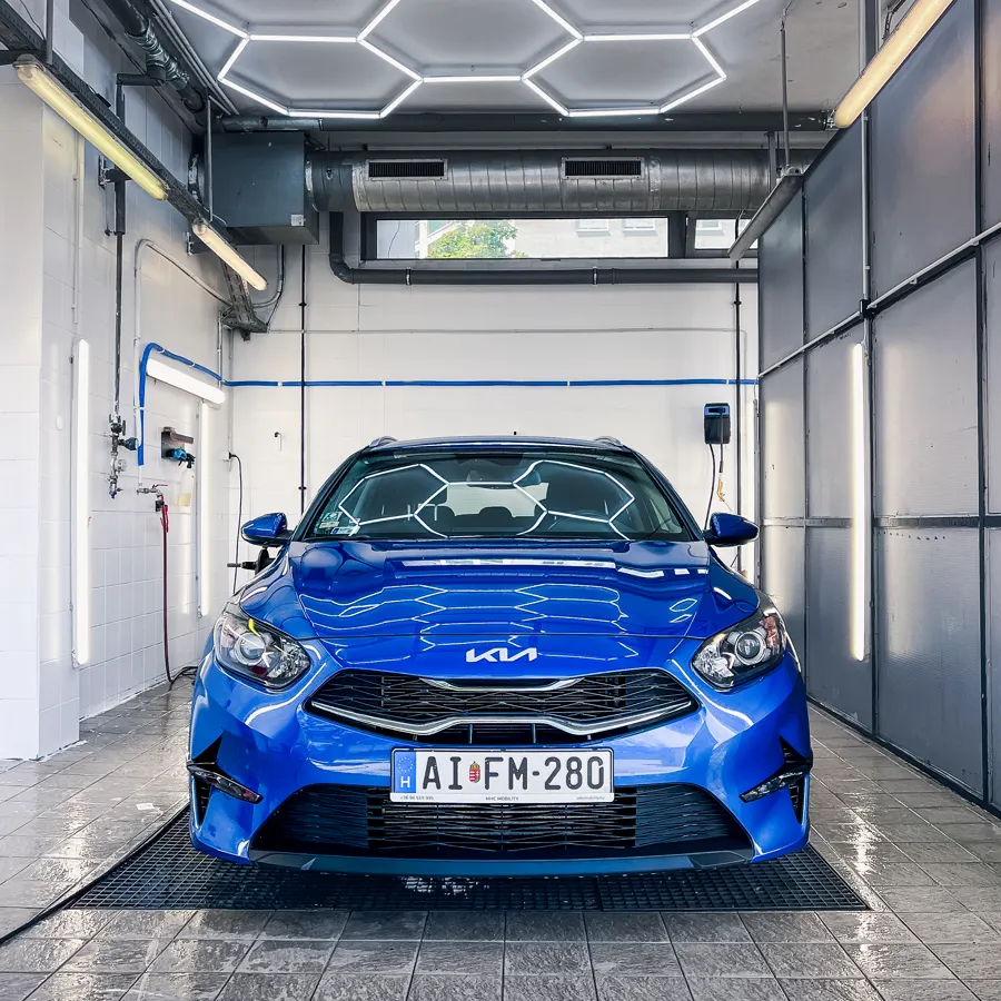 Blue Kia Ceed in the CARDOC wash bay