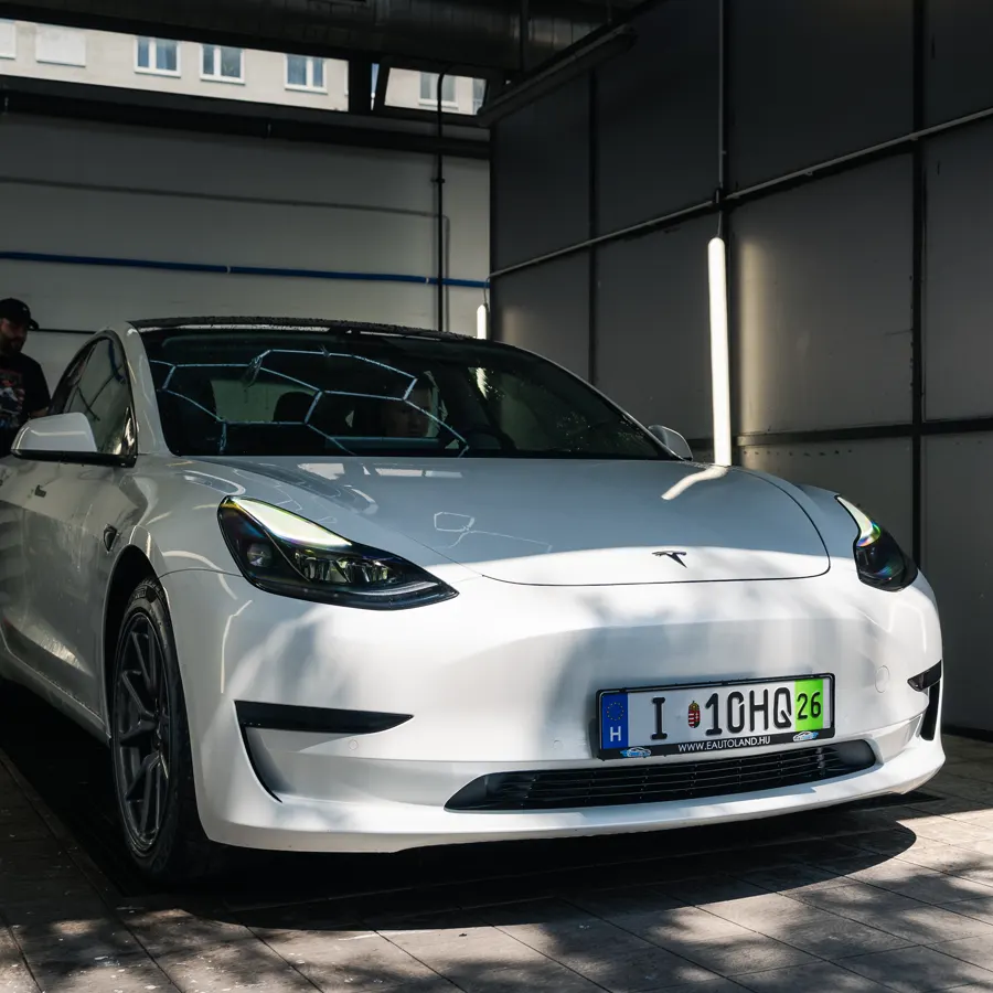 White Tesla Model 3 in the CARDOC wash bay